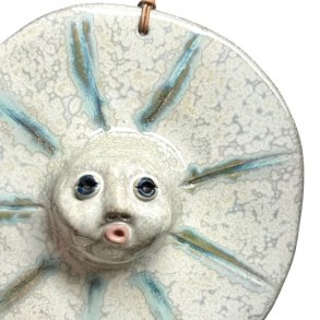 Sol -keramikfigur til vggen - grnne strler