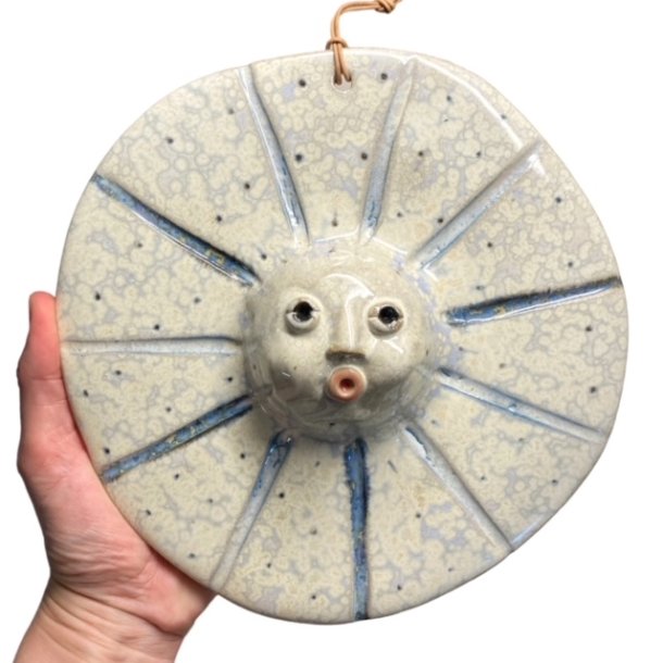 Sol -keramikfigur til vggen - bl strler