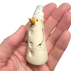 Lille finurlig keramik snemand 