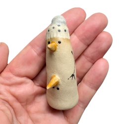 Lille finurlig keramik snemand - To gulerdder