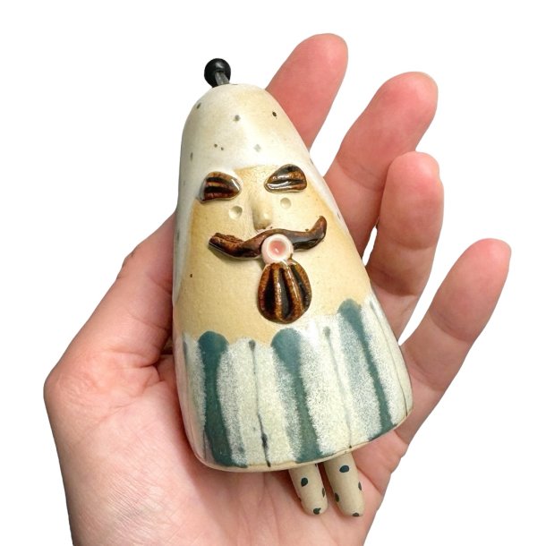 Finurlig klokke - keramikfigur - 99