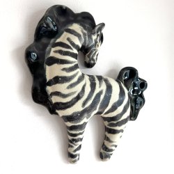 En Zebra - keramik v�gfigur